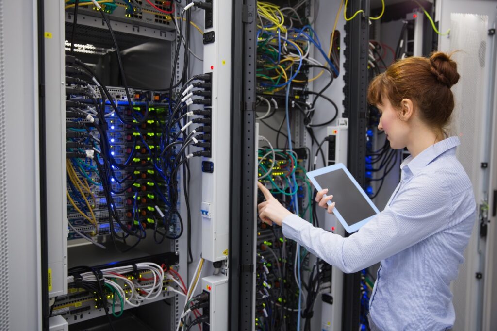 Worker engaging in server colocation Jacksonville, Fl