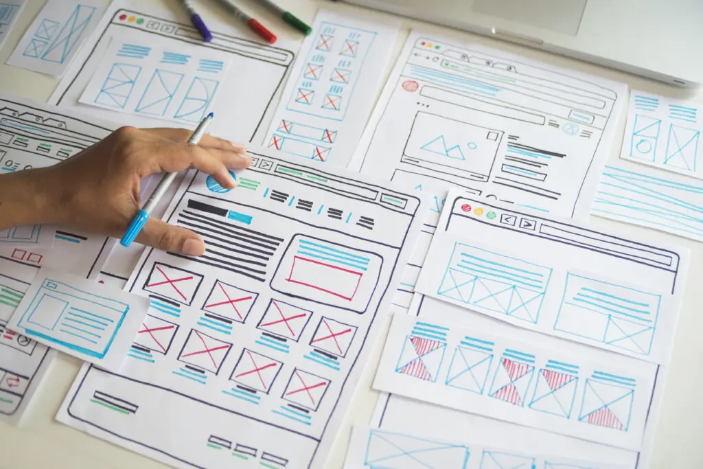 Web Design wireframes on a desk